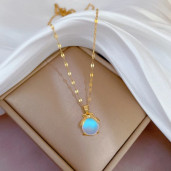 http://www.priyomarket.com/Opalite Lady Bug Gold Titanium Necklace